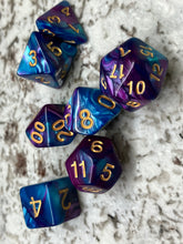 Load image into Gallery viewer, Set of seven dice for role play gaming. Shown in marine blue and dark purple with gold numbering.
