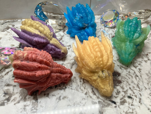 Set of five dragons from left to right: red, purple, blue, gold and green.