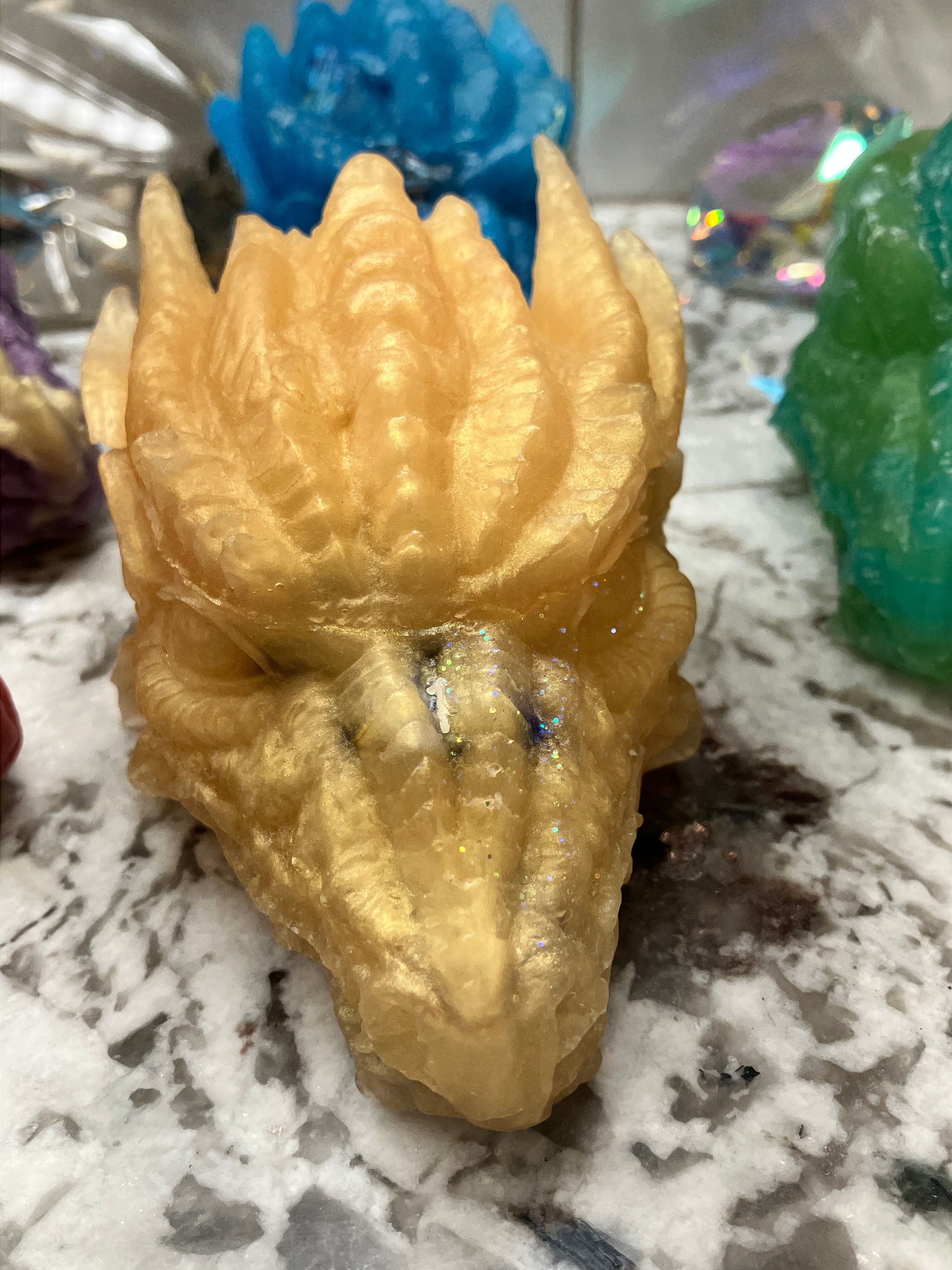 Close up of Gold dragon head soap.